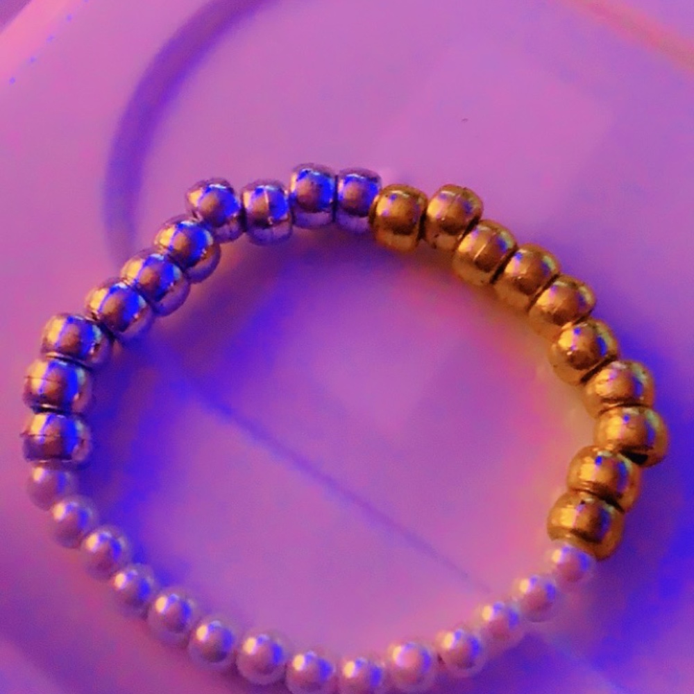 white pearls ,gold beads &silver beads.